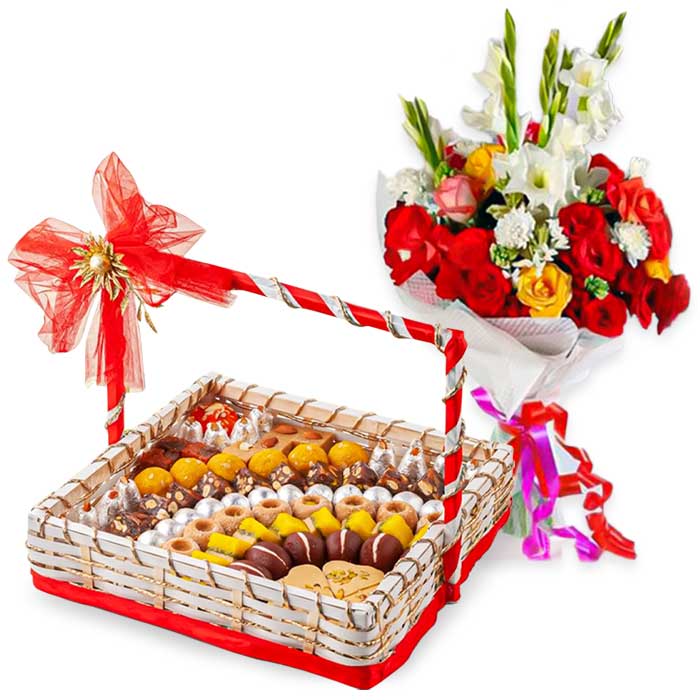 Beautiful Flowers & Assorted Mithai Basket
